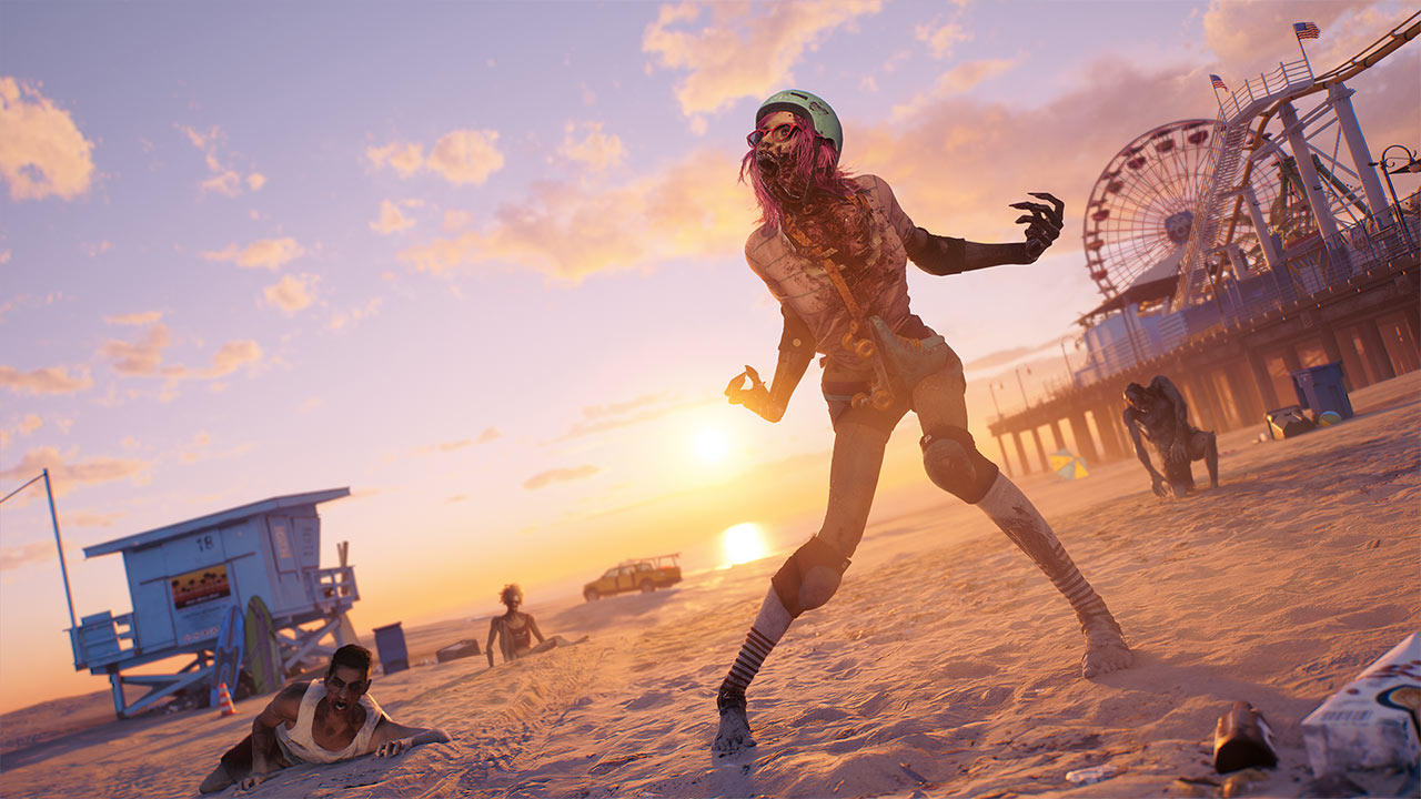 Una zombie senza mandibola sembra urlare su una spiaggia illuminata dal sole.