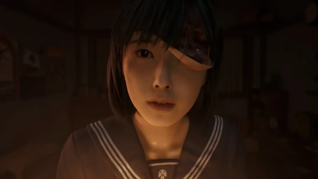 Hinako in primo piano con il viso che le si sta scollando