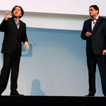 Reggie Fils-Aimé e Satoru Iwata
