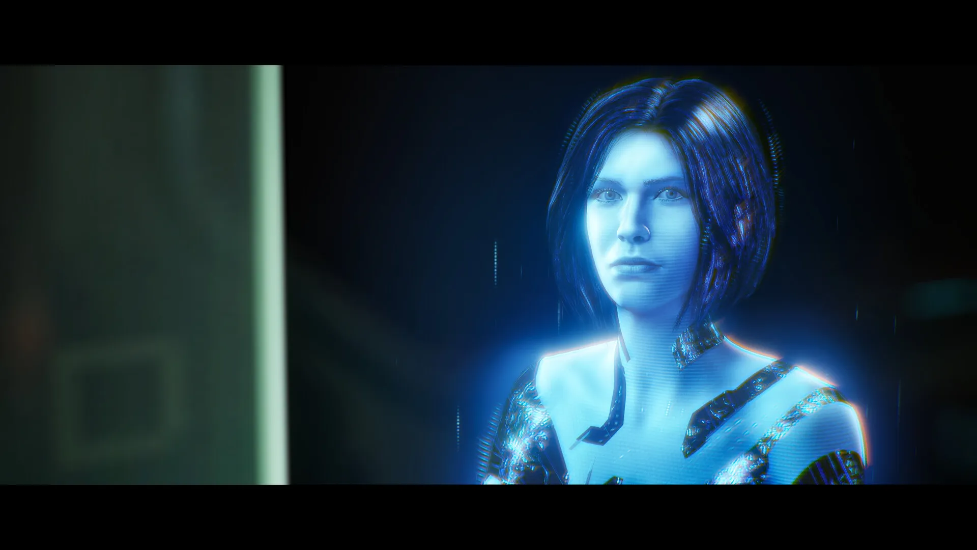 L'intelligenza artificiale Cortana sotto forma di ologramma blu con taglio di capelli a caschetto, che guarda davanti a sé.